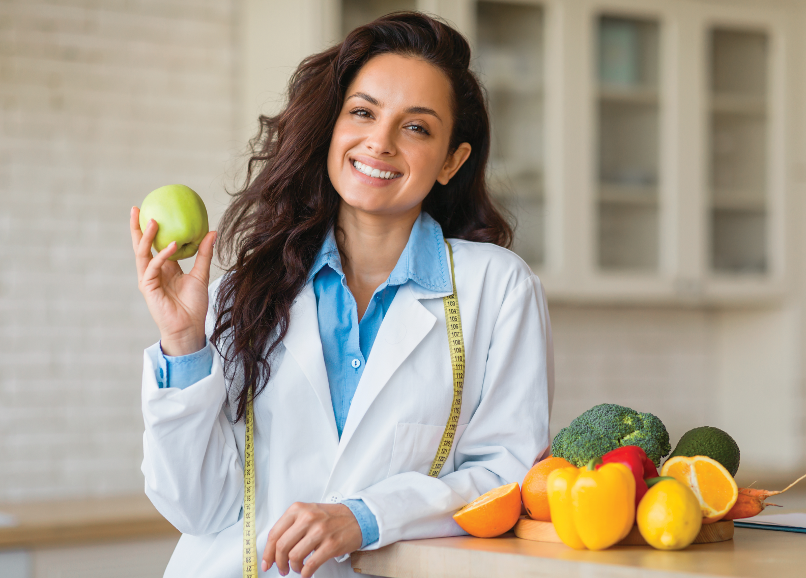 Doctor holding apple